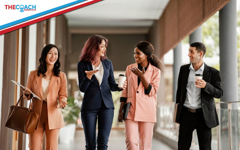 employees excitedly entering a hotel, corporate trip, July 2024, UK