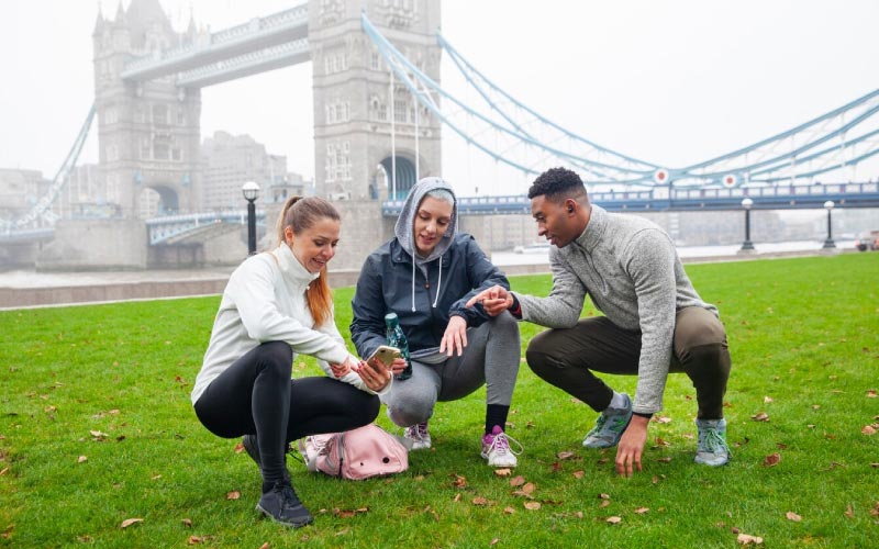 friends warming up for a running event, London marathons, August 2024, UK