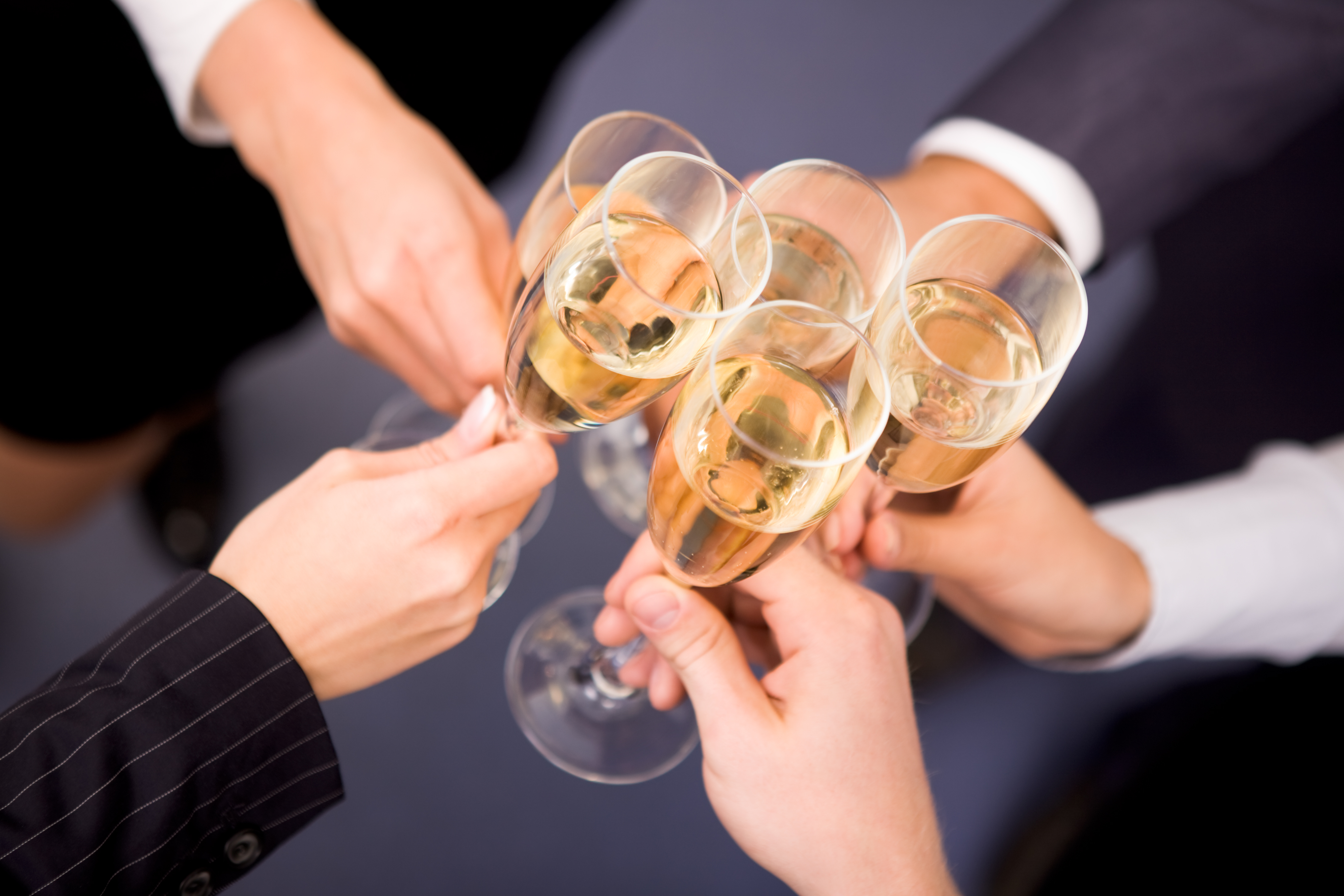 people toasting with champagne