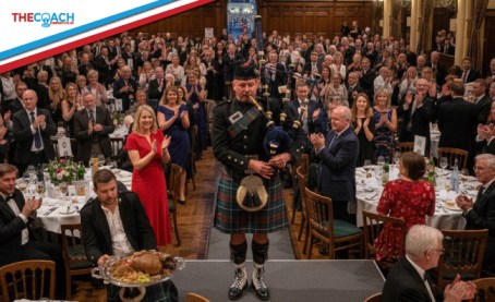 Bagpiper playing at Burns Night celebration in London