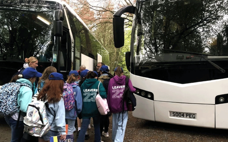 Private school students boarding coach UK