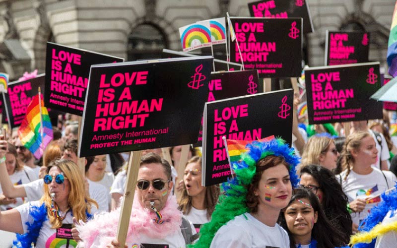 celebrating at London Pride Parade, August 2024, UK